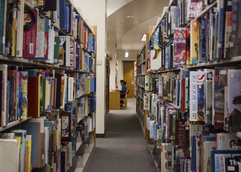 <p>Students work in the education library Wednesday afternoon. The School of Education will be getting a new dean, replacing current dean Terry Mason.</p>
