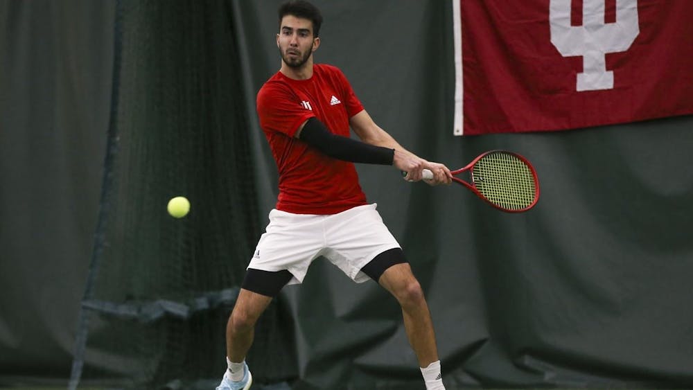 <p>Then-sophomore Luka Vukovic prepares to hit the ball during a match against Wisconsin on March 26, 2021. Indiana lost to in-state rival Purdue 4-0 on Saturday at the IU Tennis Center.</p>