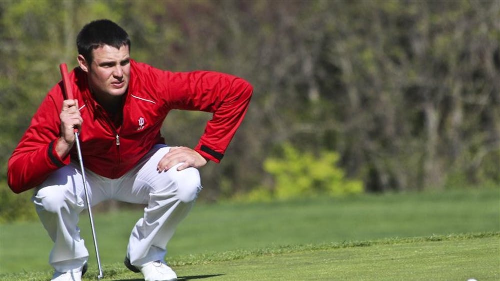 Junior John Beringer lines up a putt during his round at the NYX Hoosier Invitational on April 8 at the IU Golf Course. 