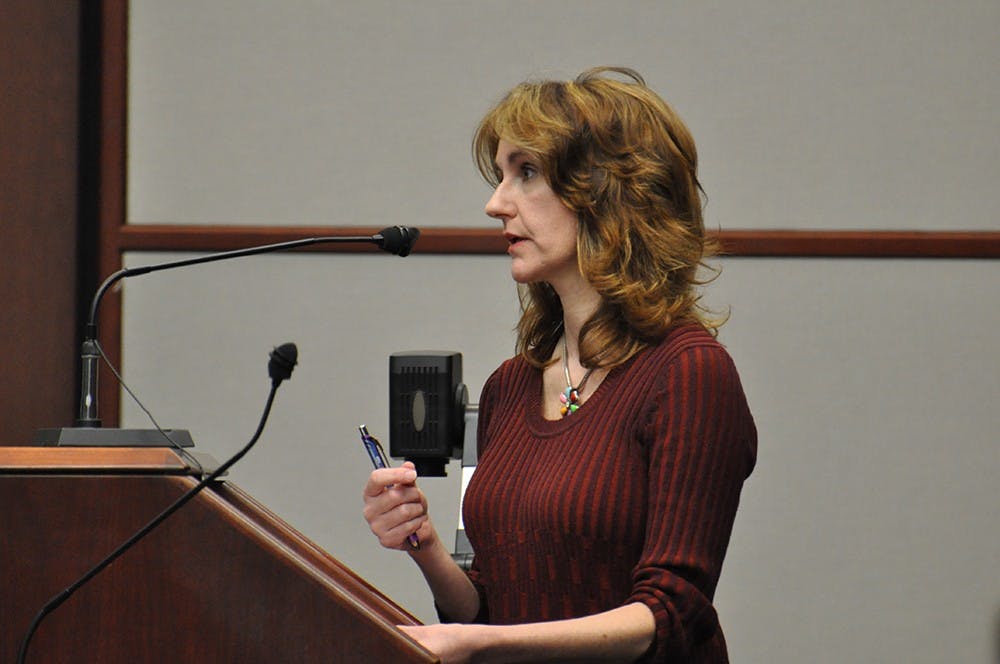 Margie Rice speaks to the Bloomington City Council at City Hall on Wednseday night. Rice answered legal questions regarding TIF districts.