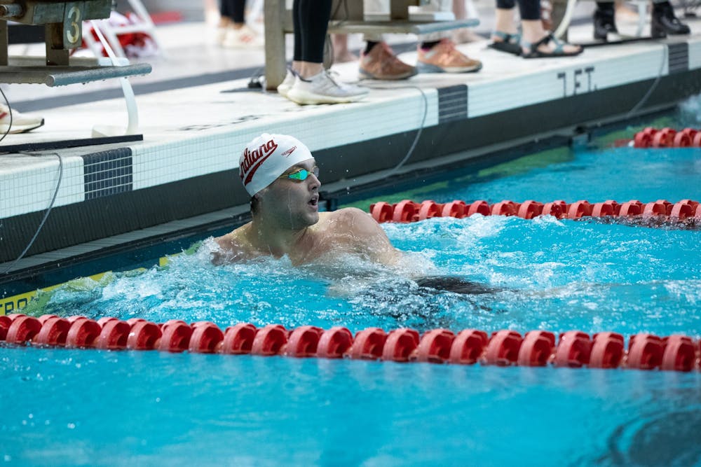 <p>Then-freshman Jasper Davis jumps off the block to swim in the mens 200 free race on Jan. 28, 2022, at the Counsilman-Billingsley Aquatic Center. This weekend, the Indiana men’s swim and dive team won its second -consecutive Big Ten Championship.</p><p></p>
