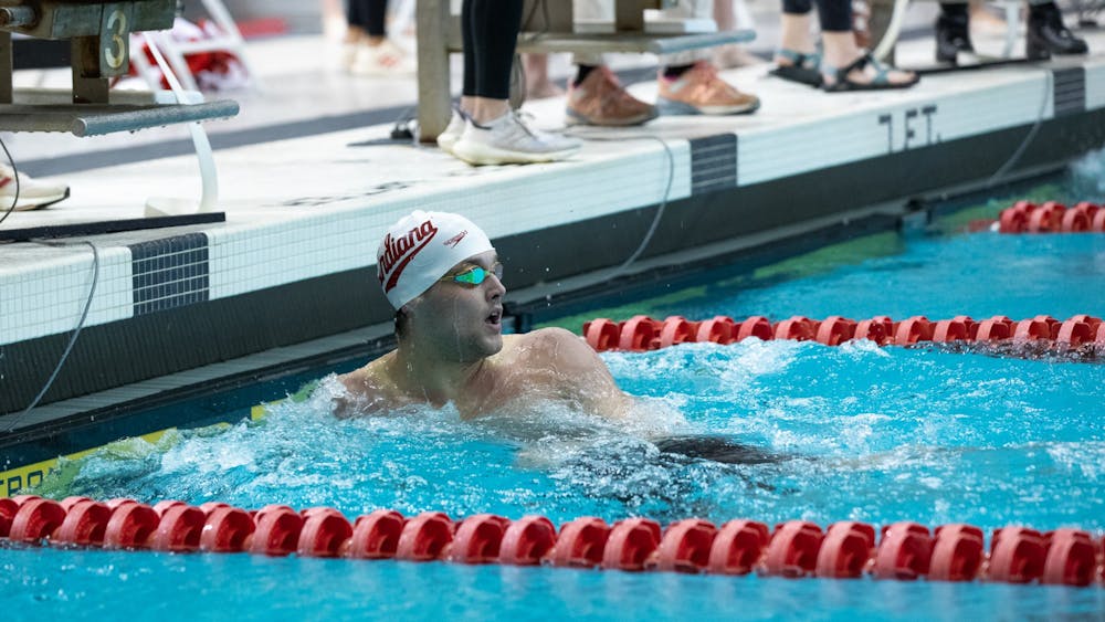 Then-freshman Jasper Davis jumps off the block to swim in the mens 200 free race on Jan. 28, 2022, at the Counsilman-Billingsley Aquatic Center. This weekend, the Indiana men’s swim and dive team won its second -consecutive Big Ten Championship.