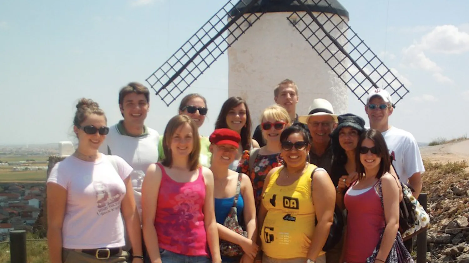 COURTESY PHOTO
Students take a group photo at the windmills of Consuegra, Spain during their four-week trip to the country. This was one excursion for the students, who took two courses on immigration in Spain during the trip.