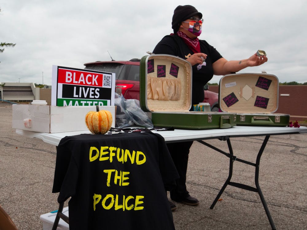 Jada Bee presents their products to shoppers at the People&#x27;s Market on Sept. 26, 2020, in Bloomington. Bee has not actively sought updates on Minneapolis Police Department officer Derek Chauvin&#x27;s trial because they want to avoid reliving the trauma of George Floyd&#x27;s killing.