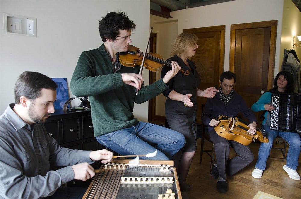 Musicians practice Feb. 3 for a memorial concert for Daniel Berg, a local doctor who died last year. The concert will take place March 10.