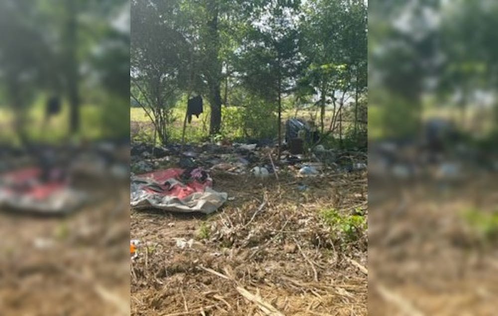<p>The property behind the At Home store in Bloomington, which had members of the unhoused community living there, was cleared out by the Monroe County commissioners June 8. </p>
