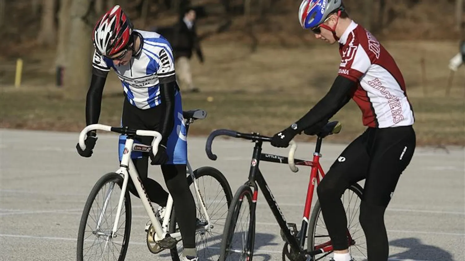 Kaleb Naegali and Robert Granger, Little 500 riders for CRU, practice Tuesday afternoon behind Assembly Hall.