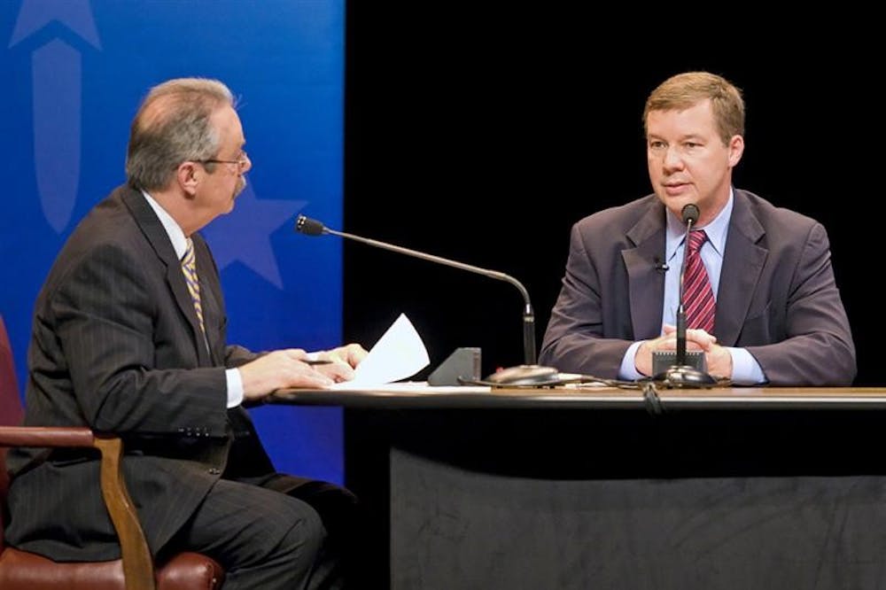 Libertarian candidate for governor Andy Horning answers a question from debate moderator Tom Cochrun during the final gubernatorial debate Tuesday night at IU Auditorium.