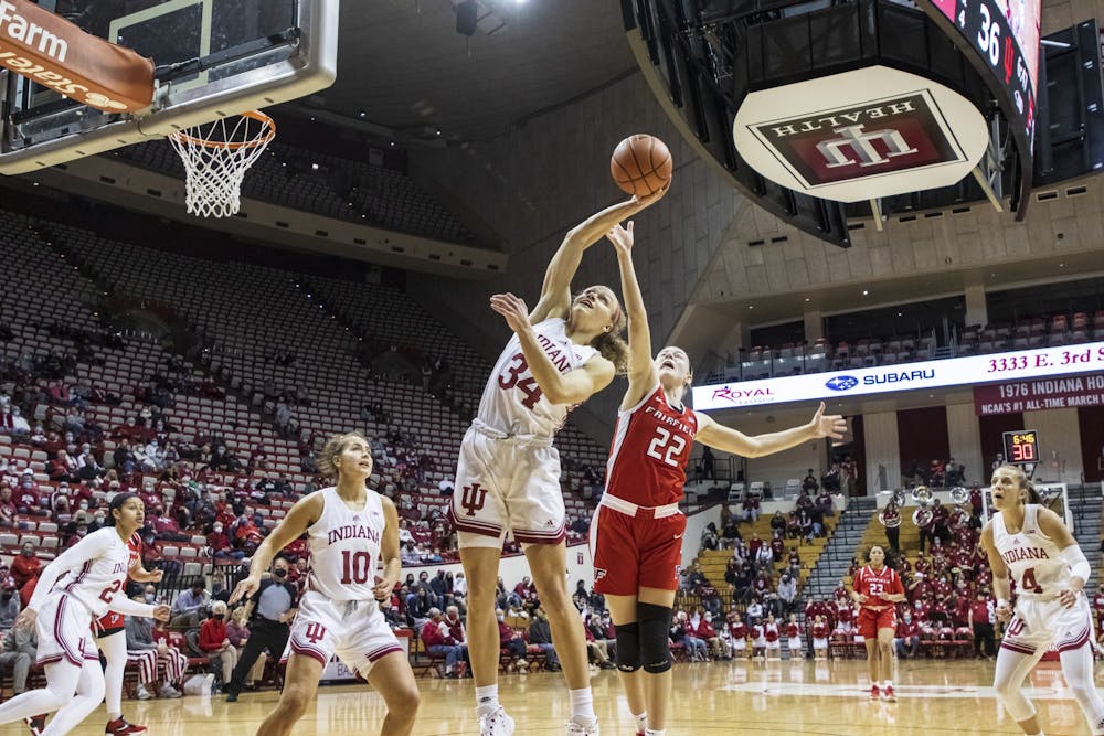 <p>Senior guard Grace Berger attempts to rebound the ball Dec. 9, 2021, at Simon Skjodt Assembly Hall. Indiana lost 72-55 against Nebraska on  Feb. 14, 2022. </p>