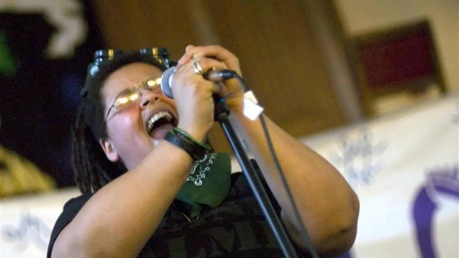 Jada B, the lead singer for all female band The Ladyquakes!, performs at Lesbopalooza Saturday afternoon at Collins LLC. The Out-sponsored event celebrating women featured drag performances, several bands, an art gallery, poetry readings, a Stich N' Bitch knitting session, and a discussion on sexual health.