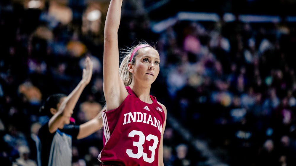 Junior guard Sydney Parrish shoots a three Feb. 5, 2023, at Mackey Arena in Lafayette. The Hoosiers beat Purdue 69-46.