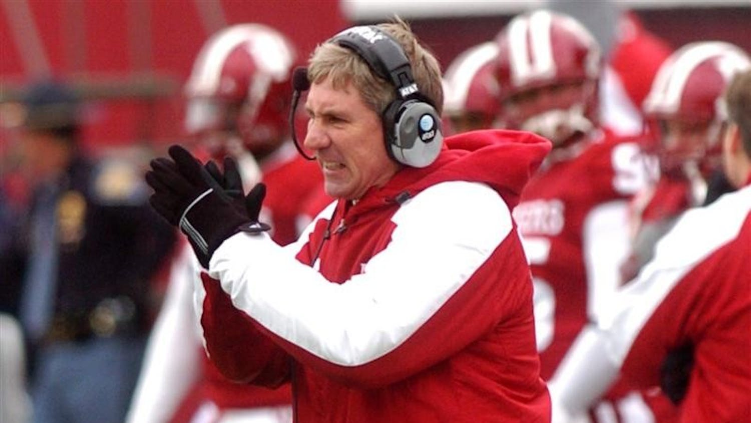 IU head coach Bill Lynch cheers on his team during the Saturday loss to Wisconsin.