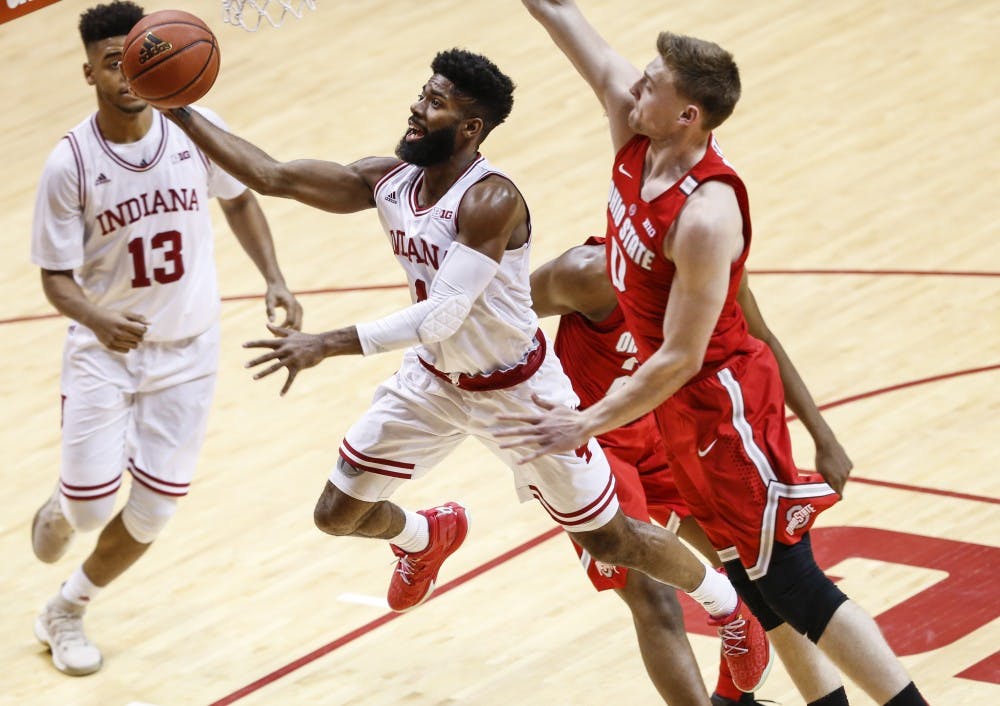 <p>Former IU men's basketball player Robert Johnson shoots a layup during the Hoosiers' game against the Ohio State Buckeyes Feb. 23 at Simon Skjodt Assembly Hall. Johnson is one of six former IU basketball players that will be participating in this year's NBA Summer League.</p>