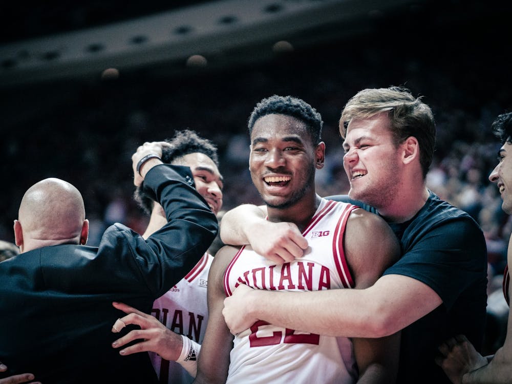 Sophomore forward Jordan Geronimo celebrates with Junior Hogan Orbaugh late in the game Jan. 14, 2023, at Simon Skjodt Assembly Hall in Bloomington, Indiana. The Hoosiers beat Wisconsin 45-63.
