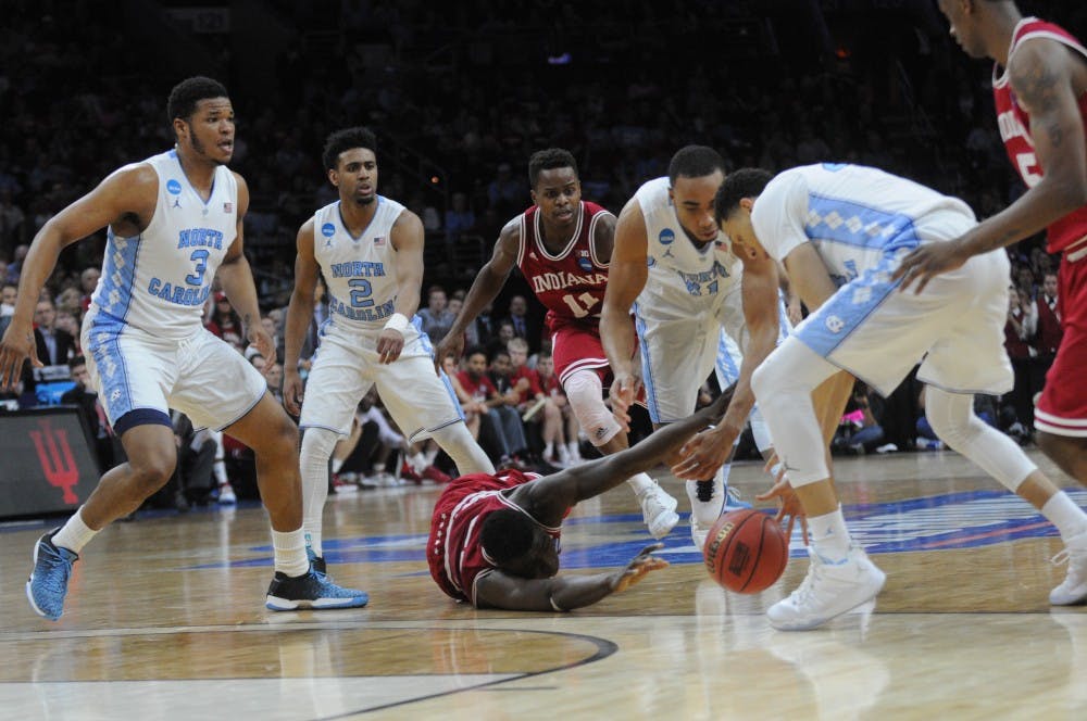 Freshman center Thomas Bryant reaches for a dropped ball against North Carolina on Friday at the Wells Fargo Center. Indiana lost 101-86.