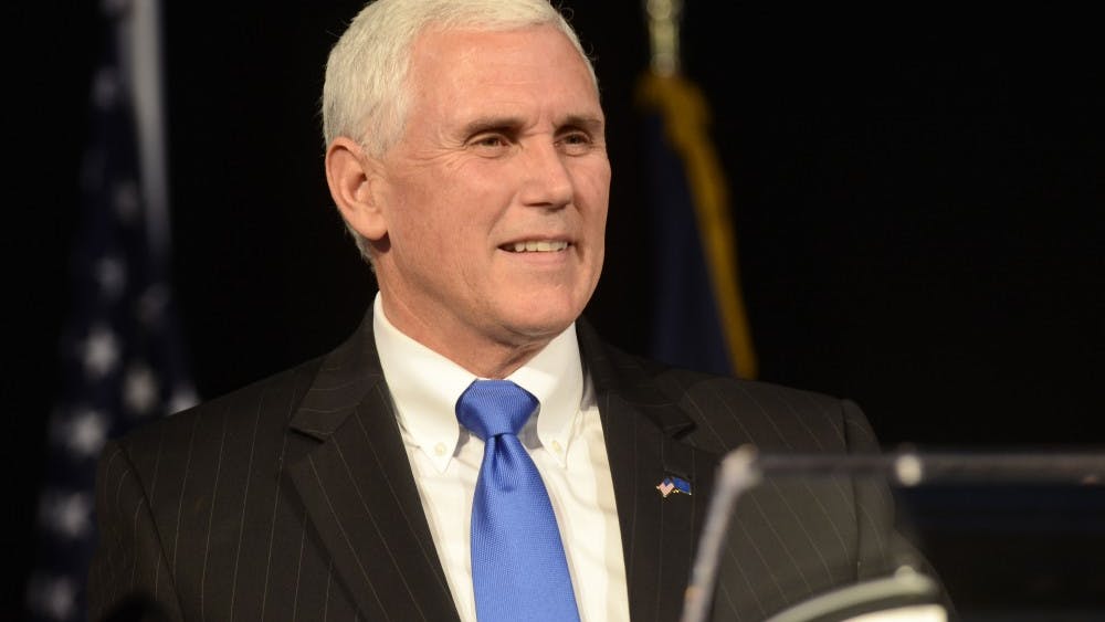 Mike Pence smiles as he give his acceptance speech Nov. 6, 2012 at Lucas Oil Stadium.