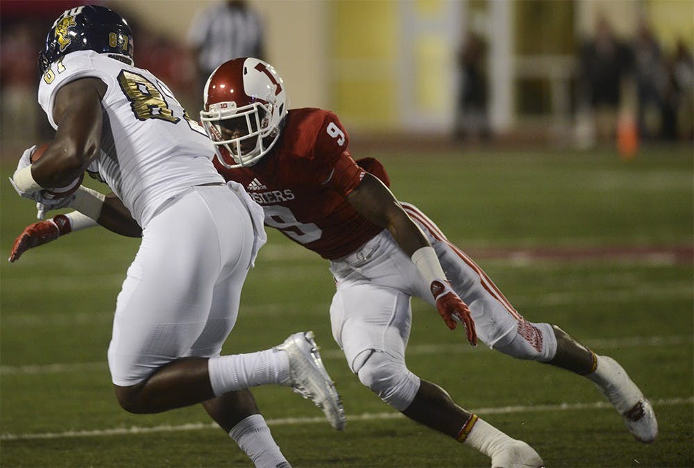 Jonathan Crawford attempts to make the tackle during the game against Florida International on Saturday at Bill Armstrong Stadium.