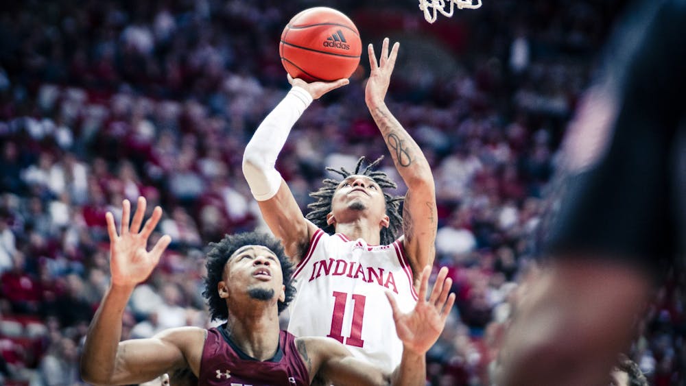 Freshman guard CJ Gunn puts up a shot in the secont half Dec. 20, 2022 at Simon Skjodt Assembly Hall in Bloomington, Indiana. The Hoosiers defeated Elon 72-96.