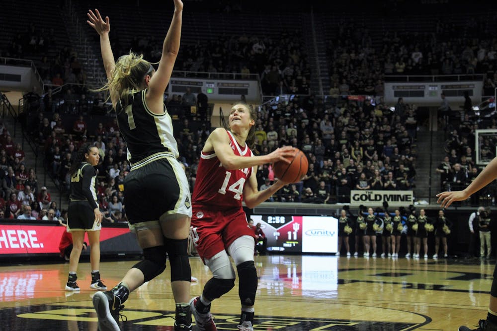 <p>Redshirt junior guard Ali Patberg attempts to shoot the ball Feb. 3 in Mackey Arena. IU defeated Purdue 66-54.</p>