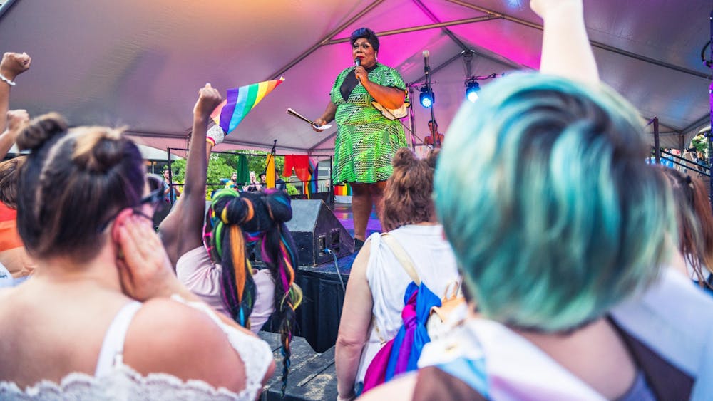 Drag performer Pat Yo Weave hosts a drag show at Pridefest on Aug. 28, 2021, on Kirkwood Avenue in Bloomington. The festival returned to Kirkwood after taking place virtually in 2020.