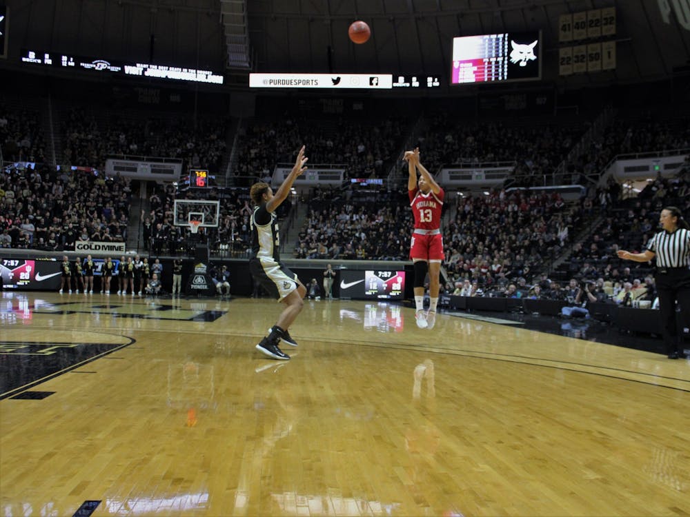 Junior guard Jaelynn Penn attempts to score a 3-point shot Feb. 3 in Mackey Arena. Penn made one of five attempted 3-pointers and 15 total points in the game against Purdue.