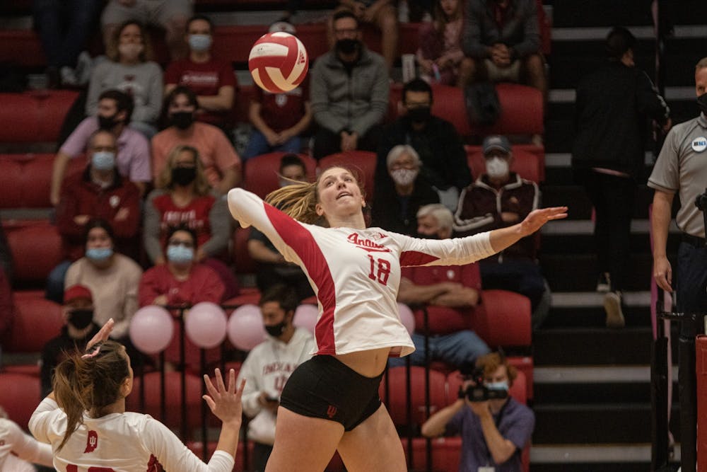 <p>Junior middle blocker Kaley Rammelsberg goes for a spike against Minnesota on Oct. 27, 2021, at Wilkinson Hall. Indiana lost to Minnesota 3-0.</p>