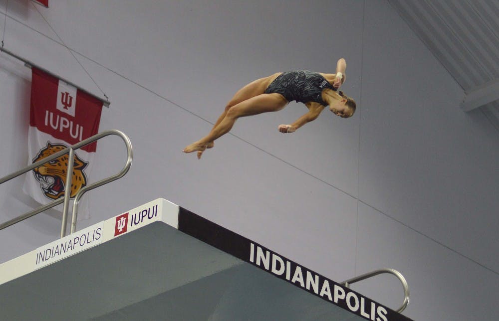 IU diver Jessica Parratto dives off the 10-meter platform during Olympic Trials Saturday night at the IUPUI Natatorium. Parratto placed first, earning a spot on Team USA.