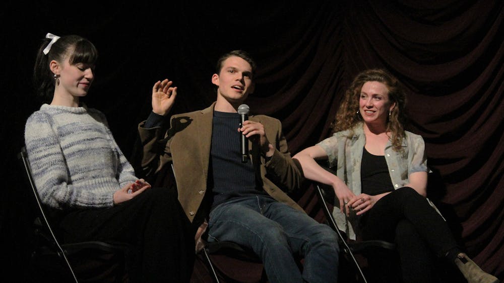 Co-director Robert Mack (center) alongside co-stars Zoe Gallagher (left) and Ahna Lipchik (right) answer questions during the premiere of &quot;Dancing Man&quot; on Feb. 26, 2023, at IU Cinema. IU Cinema screened Mack&#x27;s short film and hosted a short Q&amp;A afterward for attendees.