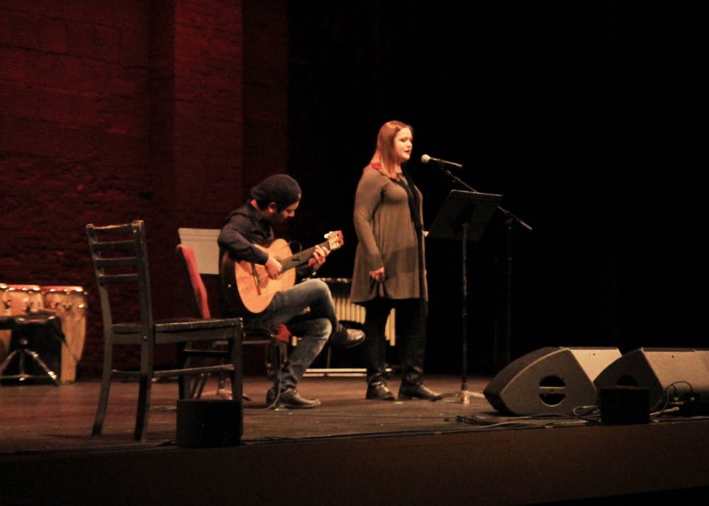 Annaka Grismer sings "Preciosa" and "Capullito de alelí" by Rafael Hernandez Marin while being accompanied by guitarist Maximiliano Larrea. They performed at the benefit concert held at Buskirk-Chumley Theater on Monday to raise funds for Mexico, Puerto Rico and other countries in the Caribbean affected by recent natural disasters. 