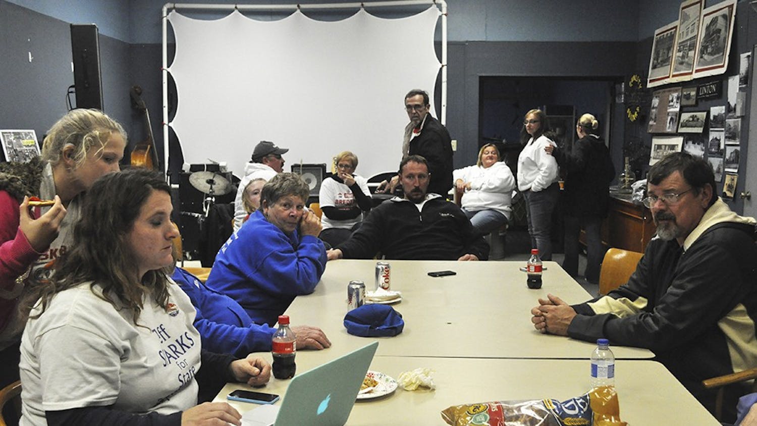 In Linton, Sparks' headquarters or an art studio rented out by the State Democratic Party, Sparks' supporters and family gathered around to keep updated on election results Tuesday, Nov. 4. The studio had no computers or ways to access the Internet so vote tallies were monitored using family members' iPhones. Terri Neighbors, Sparks' treasurer, used a borrowed computer to check the scores throughout the night.