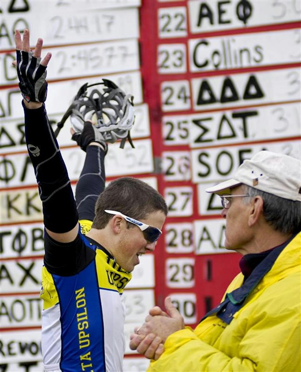 Sophomore Dan Carson of Delta Upsilon throws his hands up in celebration March 28 during qualifications.