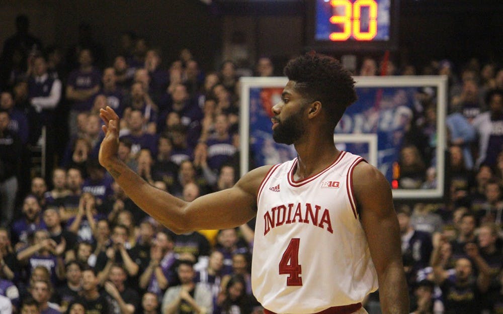 EVANSTON, ILL.- Junior guard Robert Johnson holds his hand up during the game. The Hoosiers lost to the Wildcats 55-68 on Sunday night.