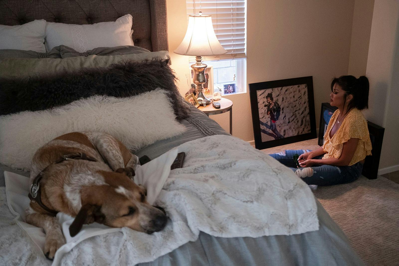 Mia St. John meditates at her home Aug. 28 in Palm Springs, California. Her son Julian St. John used to be homeless as a result of his struggle with schizophrenia and was admitted to a psychiatric facility for his safety but later took his own life there.