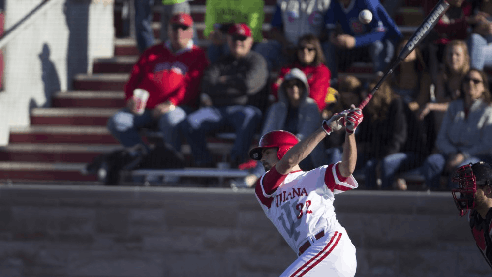 Junior infielder Luke Miller swings his bat during a game against Ball State on April 4, 2017. Miller was named Big Ten Player of the Week on Monday.