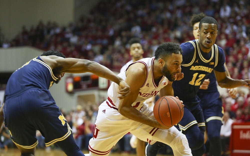 Junior guard James Blackmon Jr. blasts through Michigan defenders Sunday.