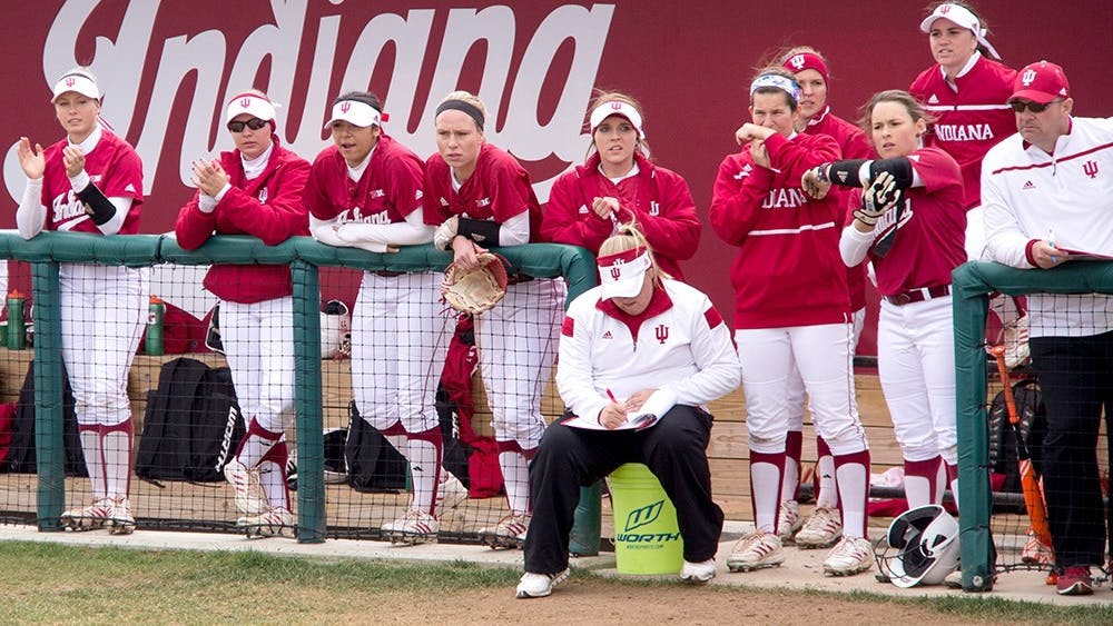 Members of IU Softball team are watching the game against #2 University of Michigan at Andy Mohr Field on Saturday afternoon. The Hoosiers lost 0-8.