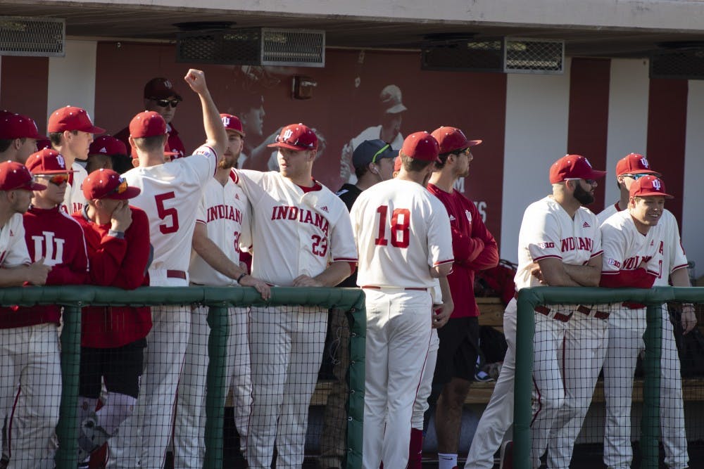 <p>The IU baseball team cheers and watches the game March 27 at Bart Kaufman Field. IU will play Wright State University on April 3. </p>