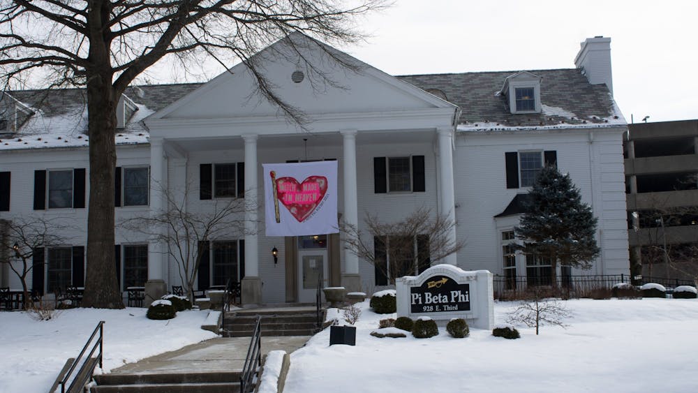 Decorations for IU sororities&#x27; Bid Night hang outside the Pi Beta Phi building on East Third Street. Bid Night will be fully virtual this year due to the COVID-19 pandemic. 