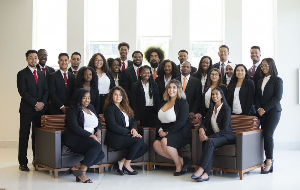 <p>Current members of the Mu Beta Lambda Business Fraternity pose for a photo in 2019. The fraternity was founded on February 17, 2012, and became the first minority-based business fraternity in the nation.</p>