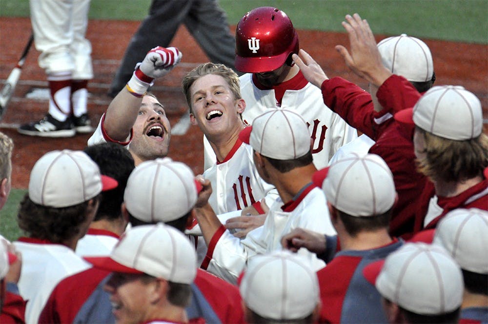 The Hoosiers celebrate Logan Sowers' solo home run on Sunday at Bart Kaufman Field. After a nearly 2 hour rain delay, IU overcame a 4 run deficit to win 7-6 and sweep their series against Purdue.