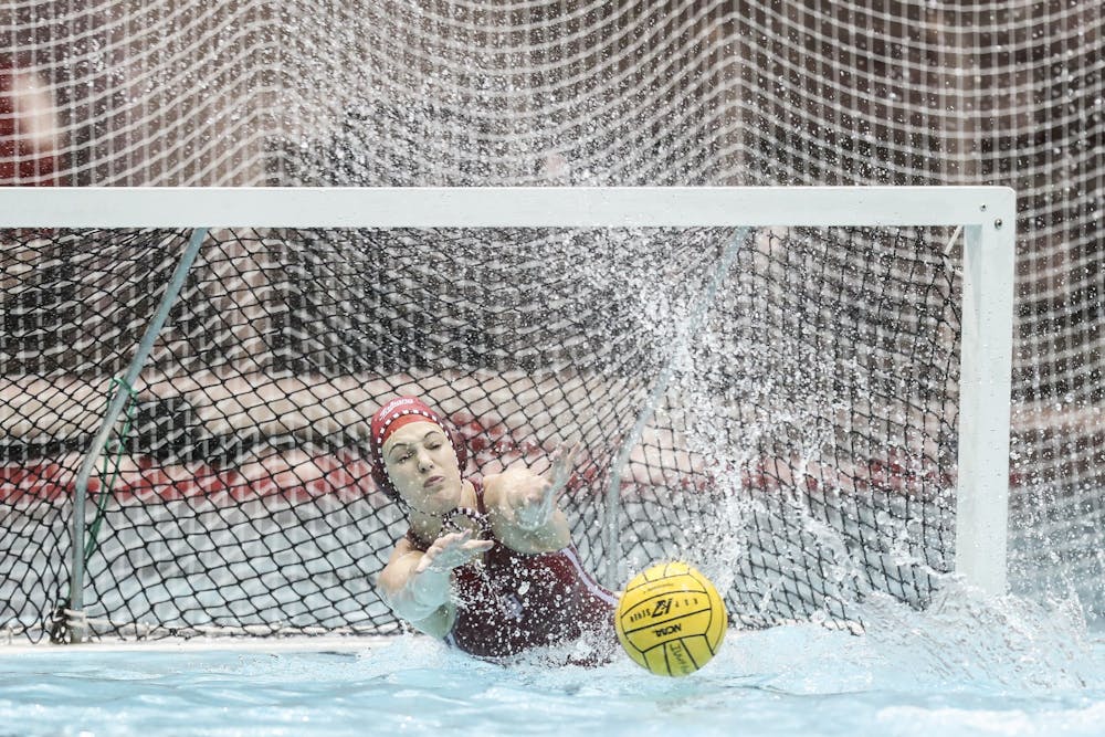 <p>Junior goalkeeper Mary Askew blocks a shot Jan. 25, 2020, at the Counsilman-Billingsley Aquatics Center. The IU women&#x27;s water polo team lost 2-9 Saturday to Arizona State. </p>