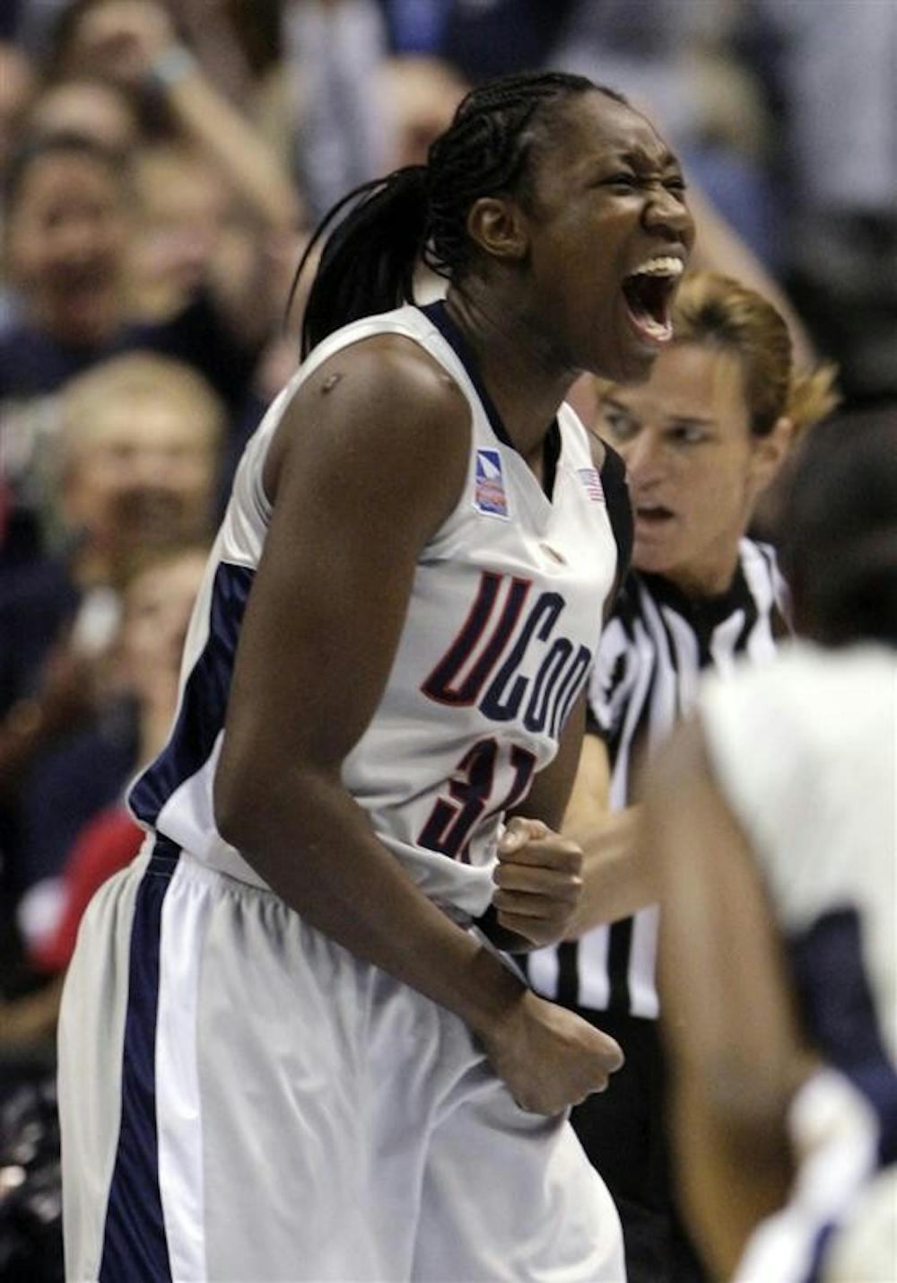 Connecticut's Tina Charles yells after a basket in the second half of the championship game against Louisville at the women's NCAA college basketball tournament Final Four on Tuesday in St. Louis.