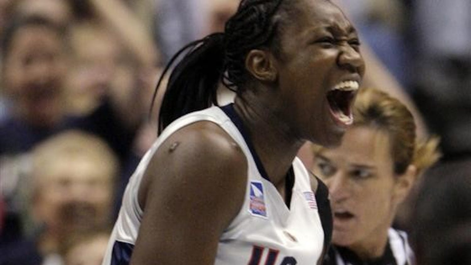 Connecticut's Tina Charles yells after a basket in the second half of the championship game against Louisville at the women's NCAA college basketball tournament Final Four on Tuesday in St. Louis.