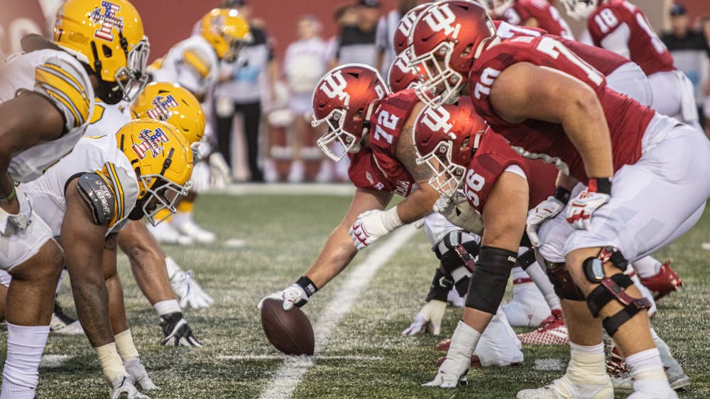 The Indiana offensive line prepares for the snap against the University of Idaho Sept. 11, 2021, at Memorial Stadium. The Hoosiers will face Idaho at 8 p.m. Sept. 1.