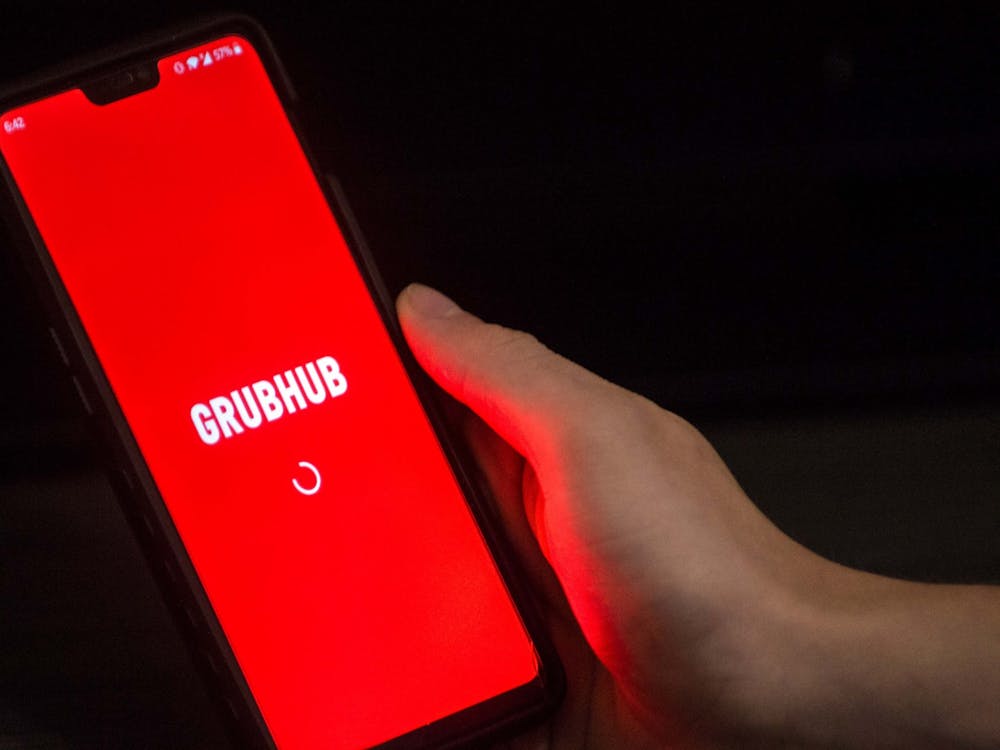 A student opens the Grubhub app on their phone Aug. 26. IU Dining has partnered with Grubhub to allow for delivery and carryout orders at campus dining halls.