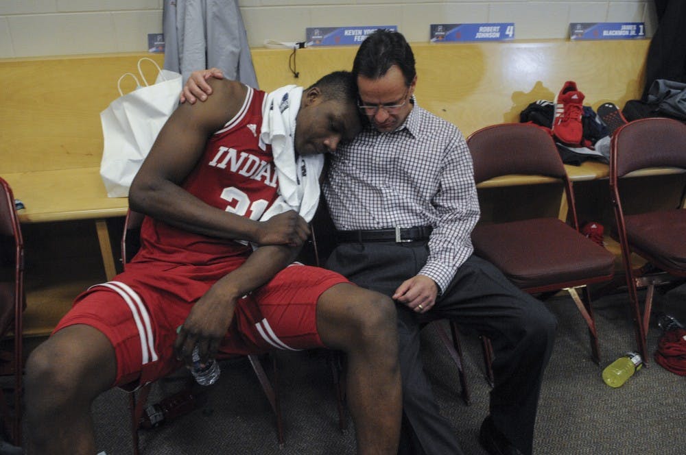 Head Coach Tom Crean consoles freshman center Thomas Bryant after the Hoosiers were eliminated from the NCAA tournament on Friday at the Wells Fargo Center. Indiana lost to North Carolina 101-86.
