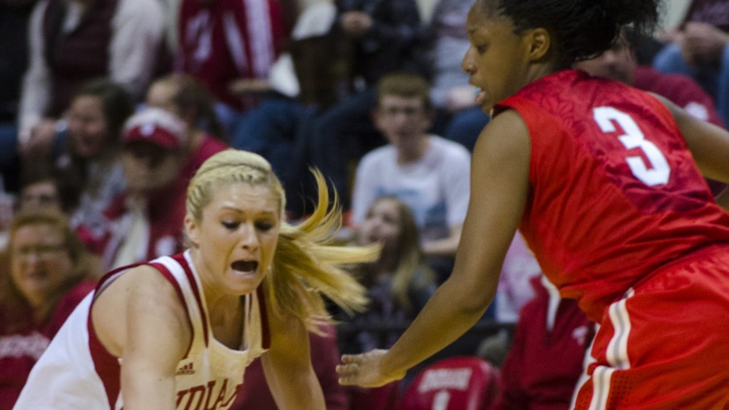Freshman guard Tyra Buss drops the ball after being fouled by a pressuring Ohio State defense during the Hoosier's game on Thursday at Assembly Hall. Indiana lost 103-49 and will play its next home game against Wisconsin on Saturday.