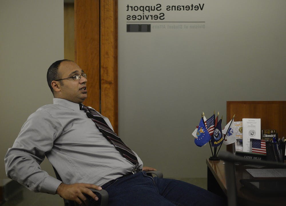 Macabee works at the Vetran Support Services office during his free time between classes. he hopes that he can help ease the stress on other veterans that finances and class scheduling can cause.