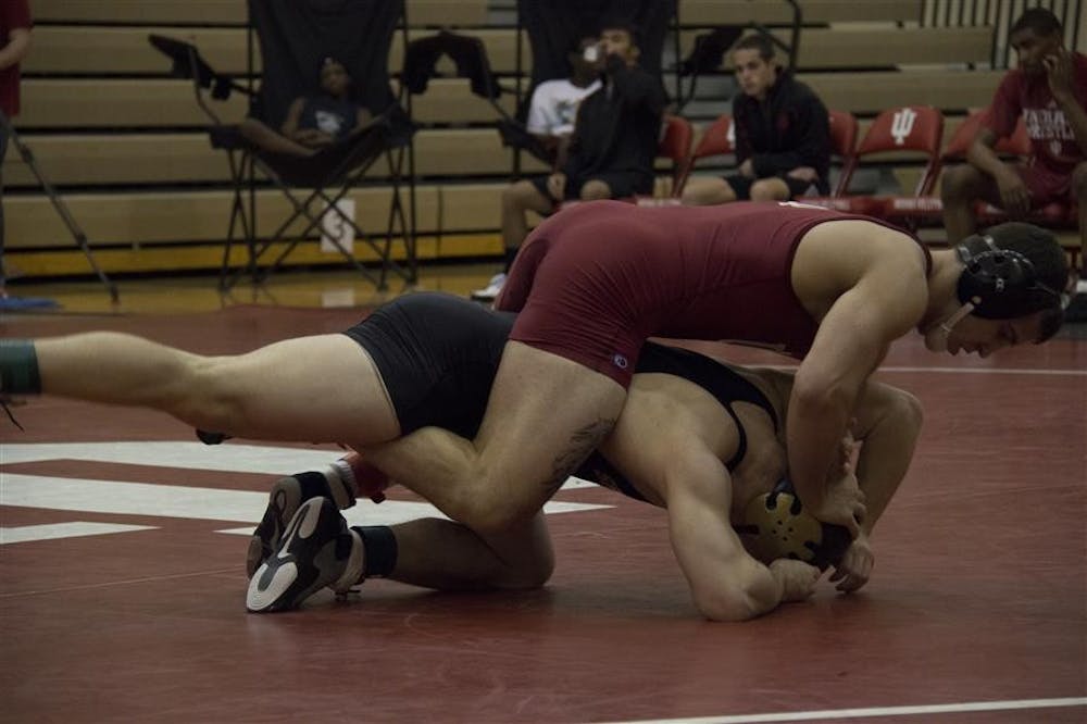 <p>Then-junior Luke Sheridan wrestles his opponent during IU&#x27;s match against Manchaster in 2013 in the University Gym. Sheridan is slated to compete in the True Third National Team Wrestle-offs on June 8 for a spot on the USA National Team roster.</p>