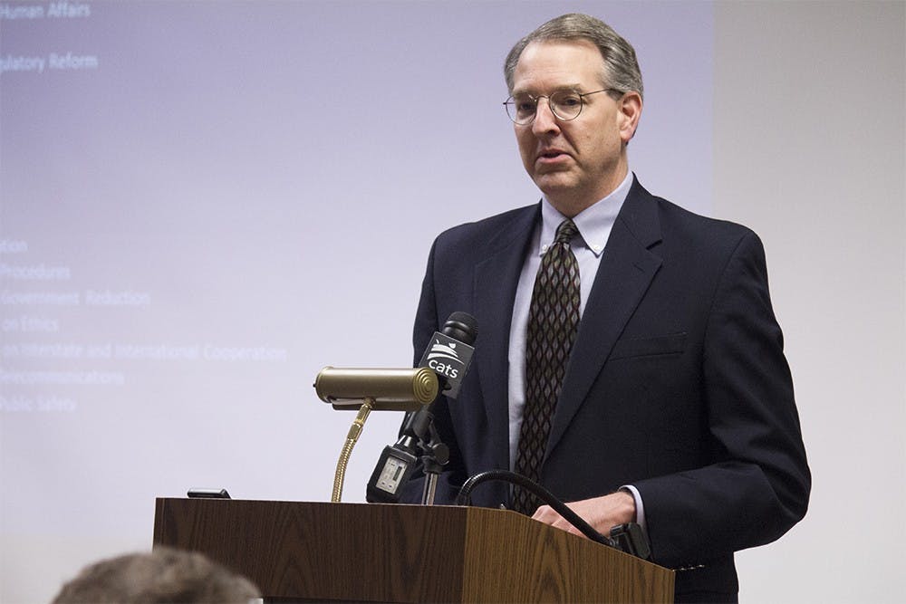 Rep. Matt Pierce, D-Bloomington, explains how the state legislature works during a lecture on Thursday night at Monroe County Public Library.